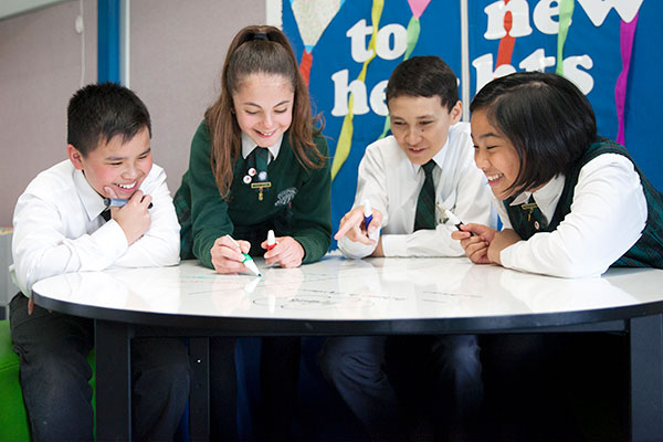 Student leaders at St Peter Chanel Catholic Primary School Regents Park brainstorming
